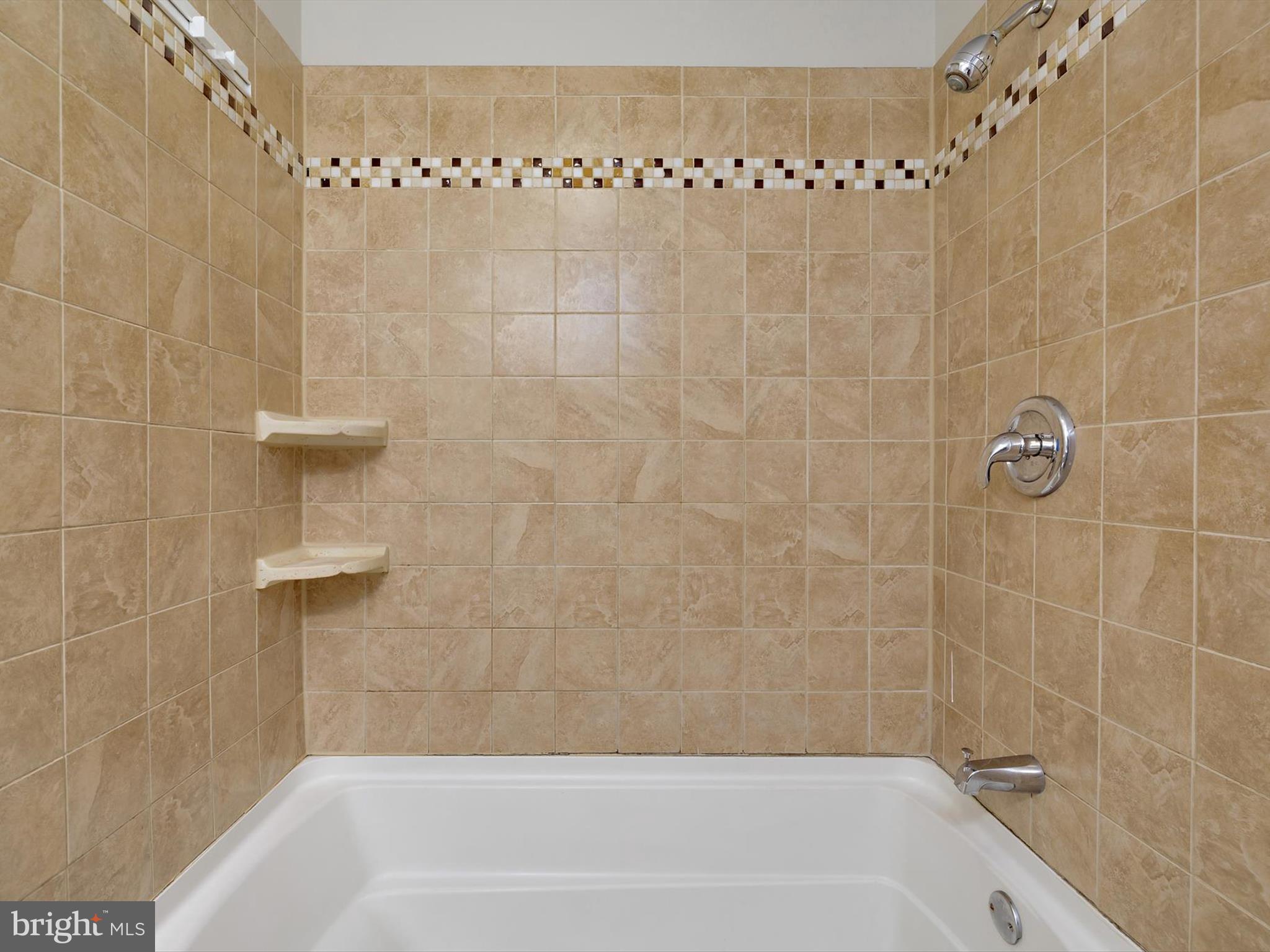 5109 Clacton Avenue, Unit 78 Suitland, MD 20746 - Photo 19 of 33 a bathroom with a shower
