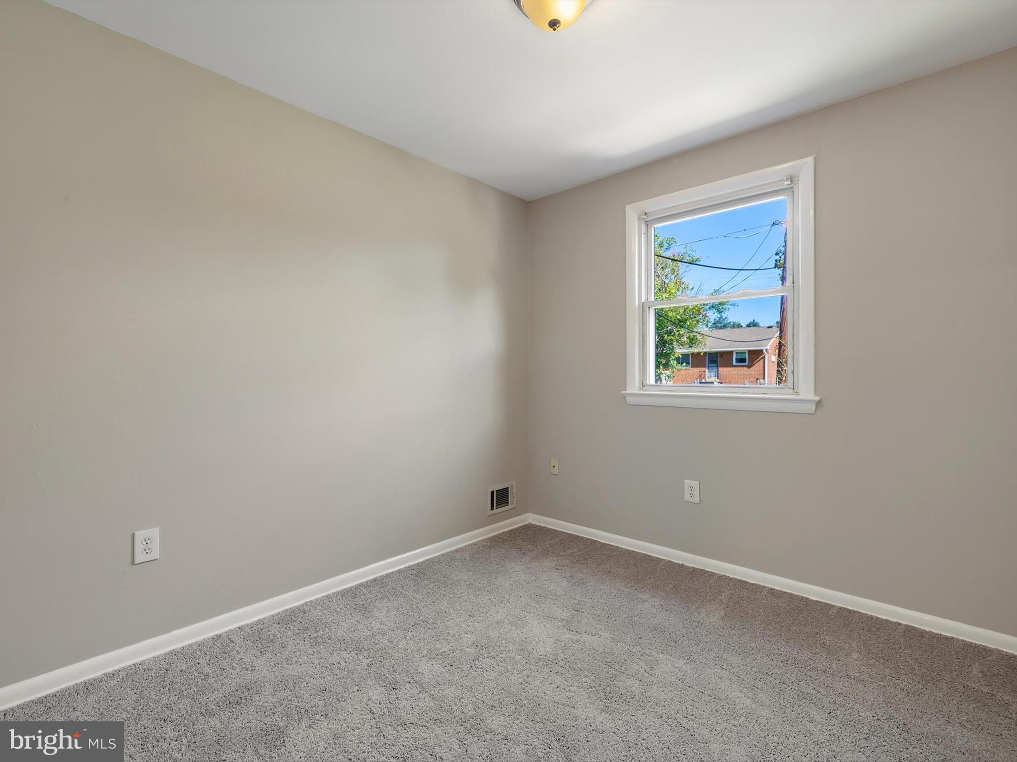 5109 Clacton Avenue, Unit 78 Suitland, MD 20746 - Photo 20 of 33 an empty room with a window
