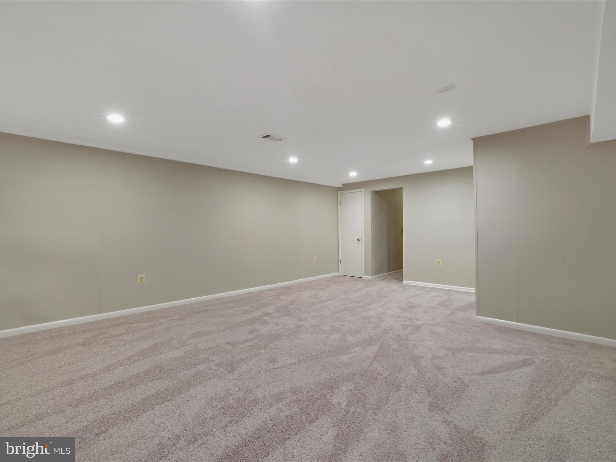 5109 Clacton Avenue, Unit 78 Suitland, MD 20746 - Photo 26 of 33 a view of an empty room