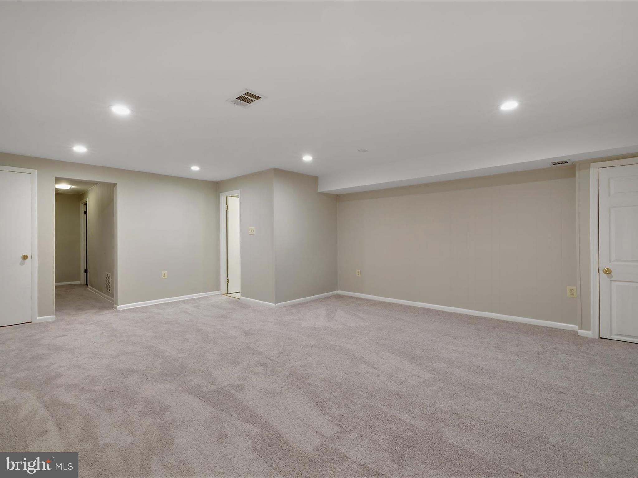 5109 Clacton Avenue, Unit 78 Suitland, MD 20746 - Photo 27 of 33 a view of an empty room with a window