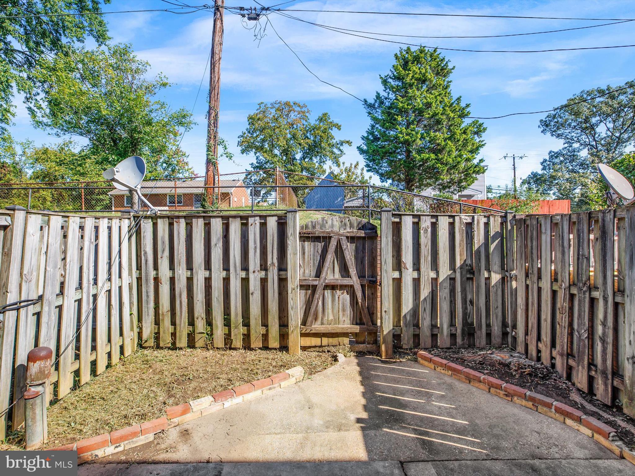 5109 Clacton Avenue, Unit 78 Suitland, MD 20746 - Photo 30 of 33 a view of wooden deck in front of a house