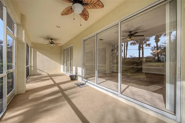 a view of backyard with tub and seating space