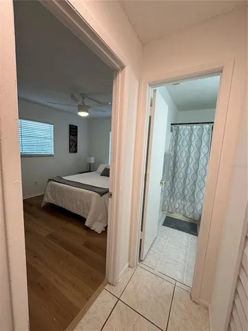 a bathroom with a sink toilet and mirror