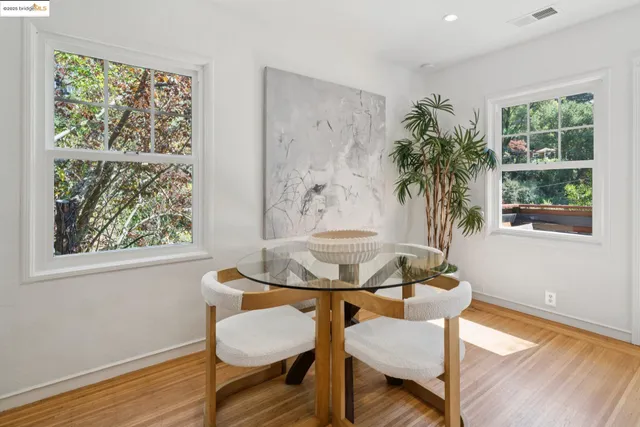 a outdoor dining space with furniture and window