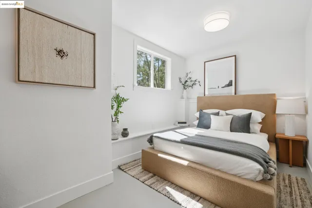 a kitchen with stainless steel appliances kitchen island granite countertop a refrigerator and a stove top oven