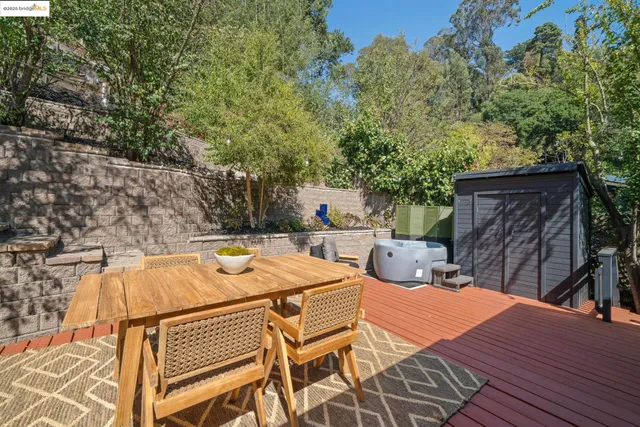 a view of a patio with wooden floor