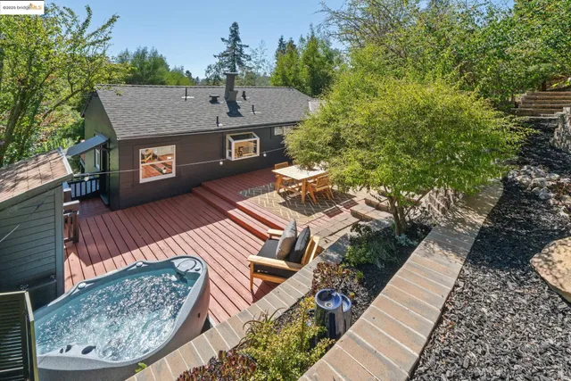 a view of balcony with two chairs and a table