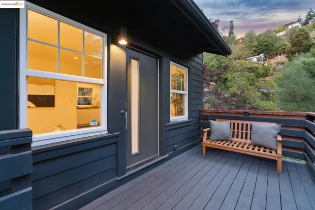 a view of a wooden bench sitting on a deck