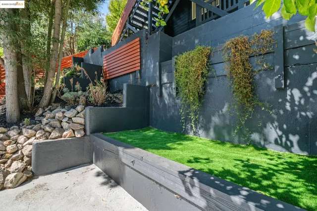 a backyard of a house with lots of green space