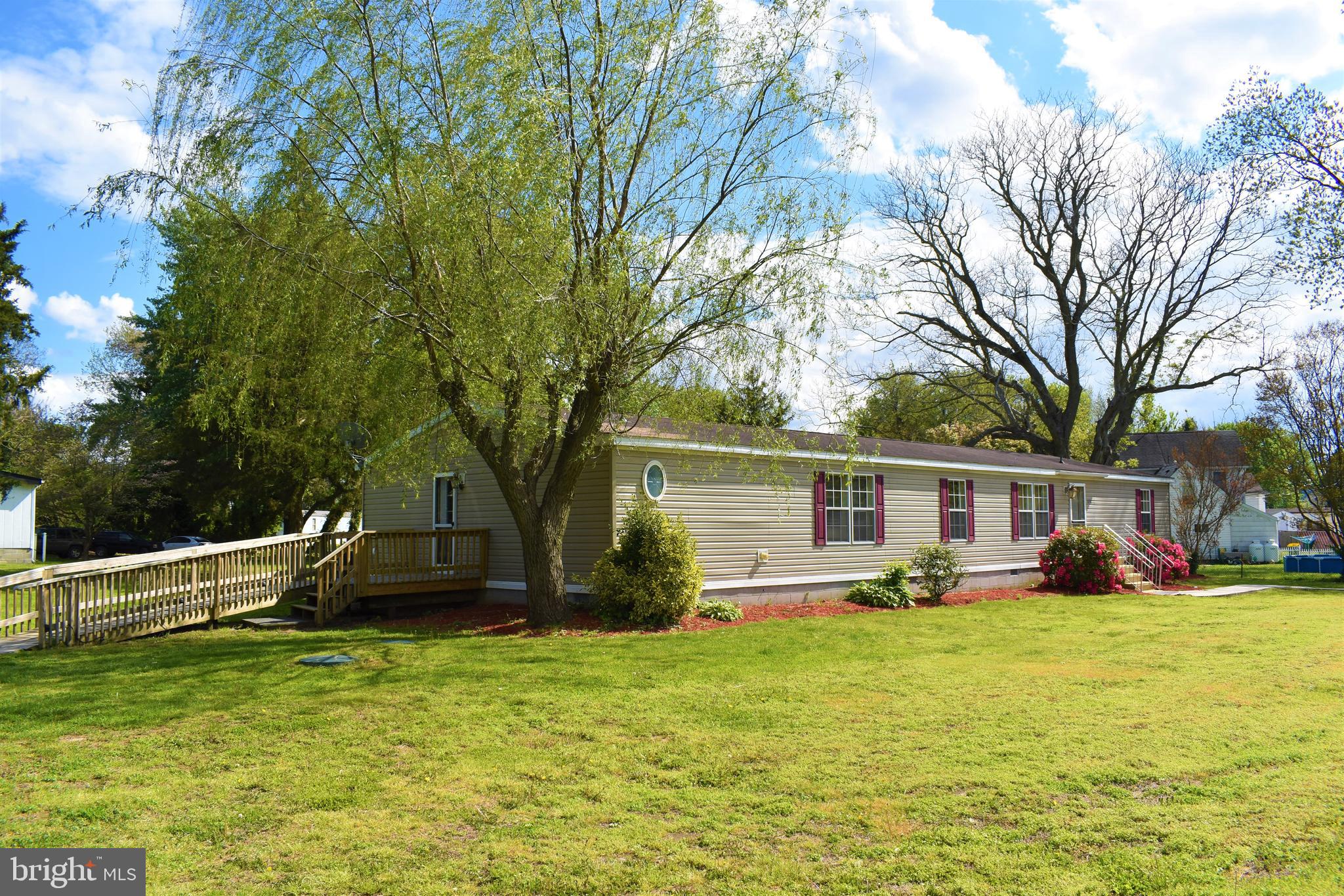 1650 Cypress Branch Road Magnolia, DE 19962 - Photo 3 of 34 a front view of house with yard and green space