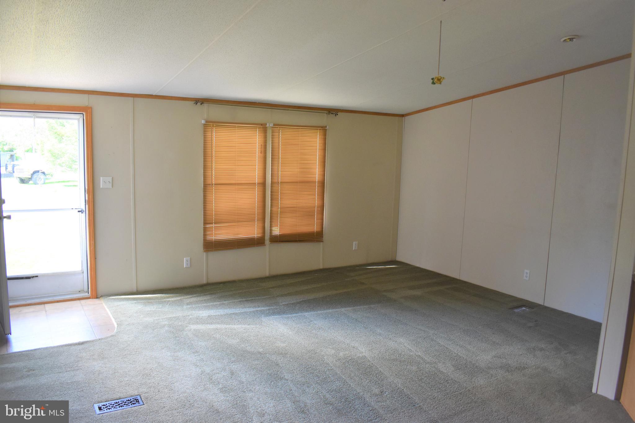 1650 Cypress Branch Road Magnolia, DE 19962 - Photo 25 of 34 an empty room with windows