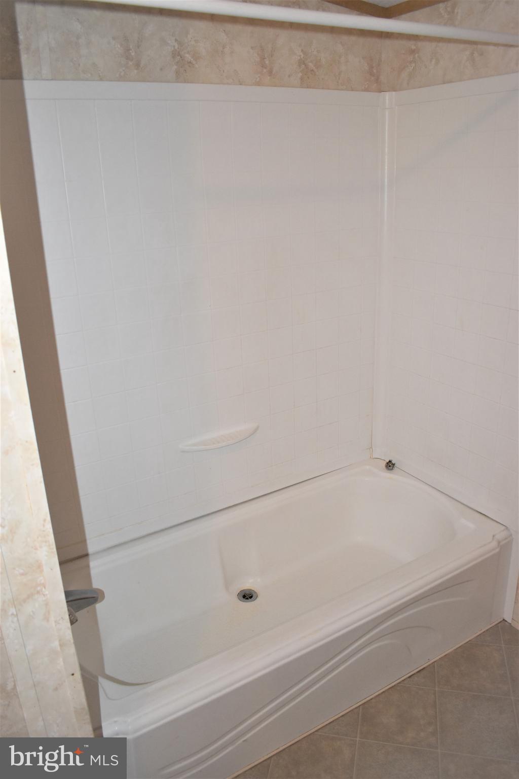 1650 Cypress Branch Road Magnolia, DE 19962 - Photo 28 of 34 a bathroom with a bathtub