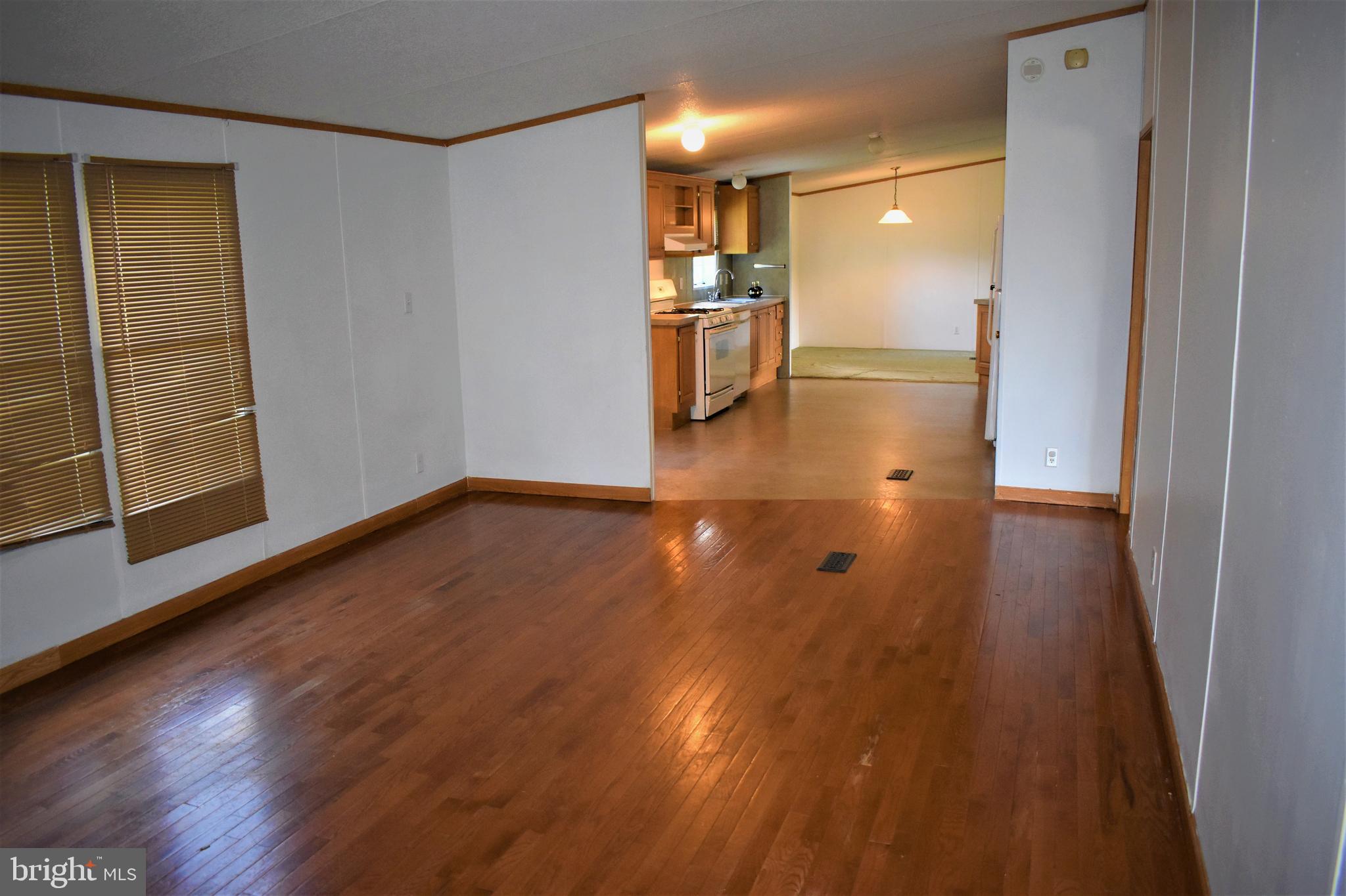 1650 Cypress Branch Road Magnolia, DE 19962 - Photo 9 of 34 a view of a room with wooden floor and a window