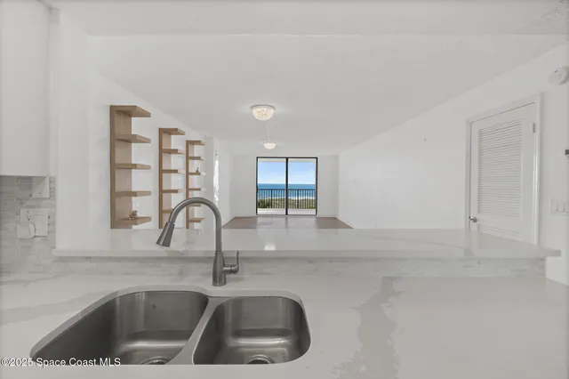 a view of a balcony with an ocean view