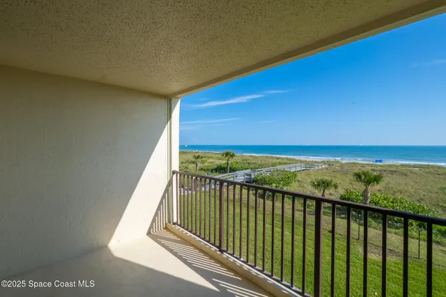 a view of balcony with ocean view