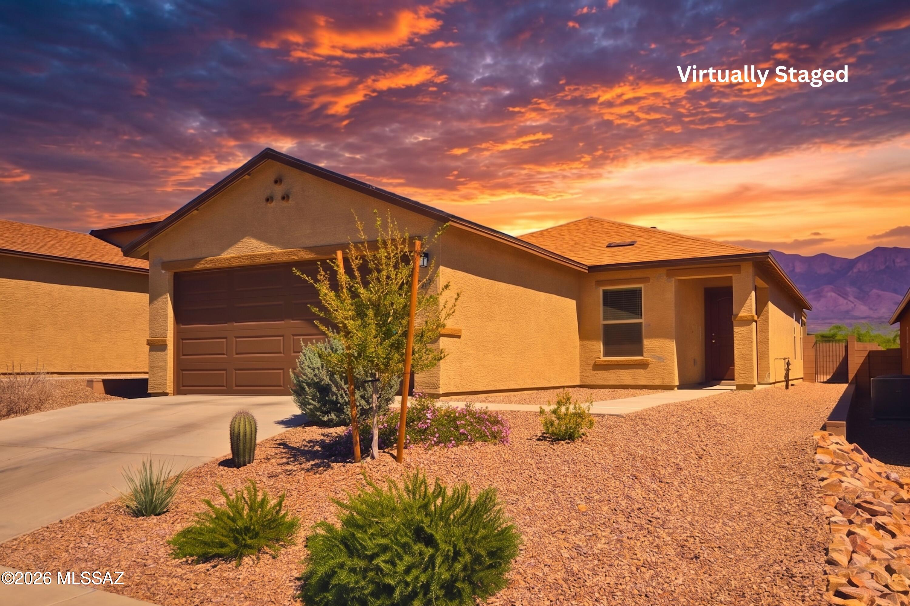 6343 South Rigby Way Tucson, AZ 85746 - Photo 25 of 29 a view of backyard with a large tree