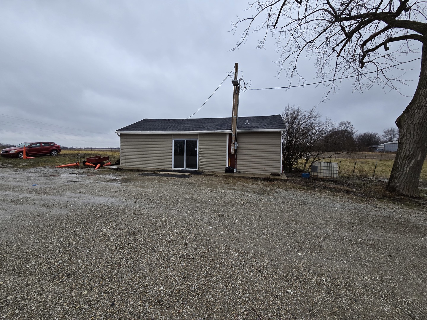 3303 East Exchange Street Crete, IL 60417 - Photo 20 of 38 a view of a house with a back yard