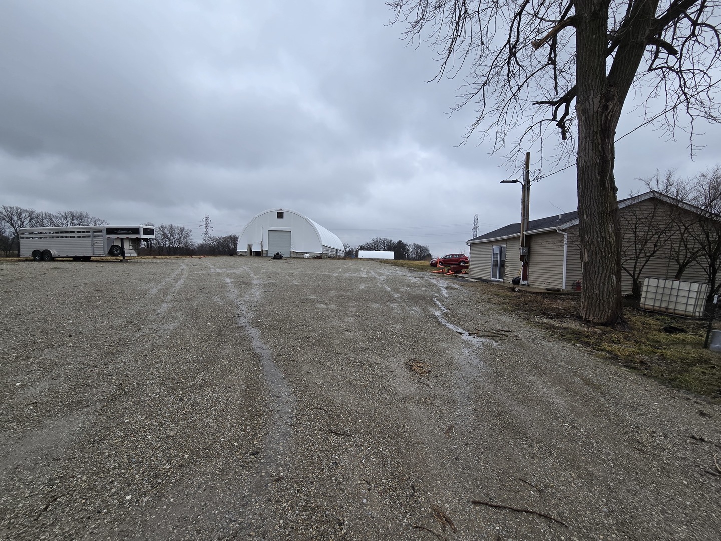 3303 East Exchange Street Crete, IL 60417 - Photo 33 of 38 a view of a large tree in front of a house