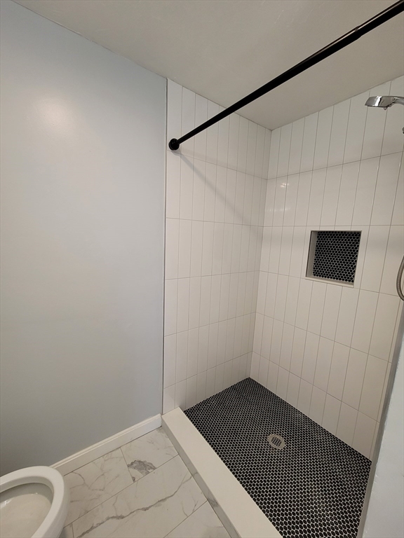 7 Gibbs Street, Unit 7 Worcester, MA 01607 - Photo 14 of 20 a bathroom with a shower