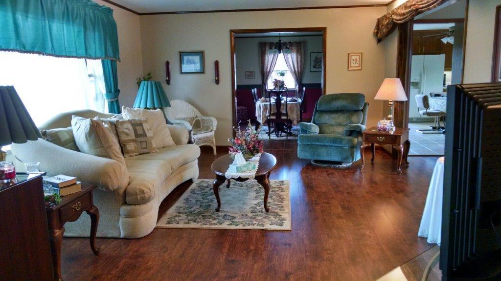 17 Town Road Fayetteville, TN 37334 - Photo 21 of 22 LIVING ROOM OPEN TO DINING AND FAMILY ROOM-NEW LOW MAINTENANCE FLOORING