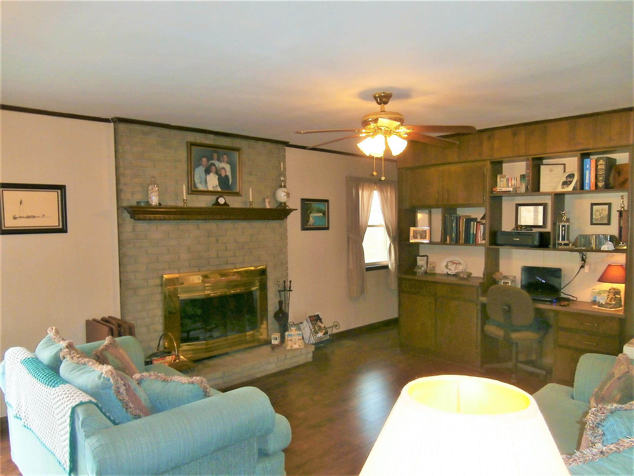 17 Town Road Fayetteville, TN 37334 - Photo 3 of 22 FAMILY ROOM WITH WOOD BURNING FP AND BUILT IN BOOKCASE