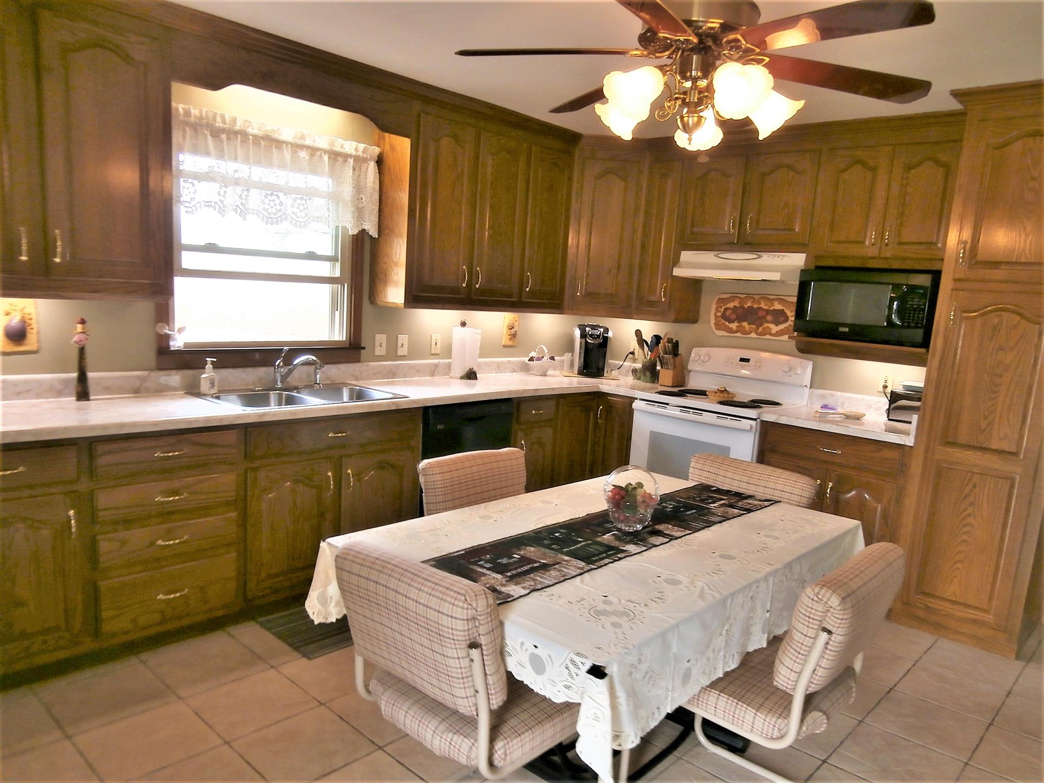 17 Town Road Fayetteville, TN 37334 - Photo 6 of 22 KITCHEN LEADS OUT TO SUNDECK