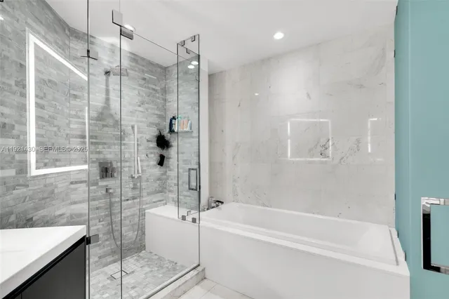 a room with gym equipment and a flat screen tv