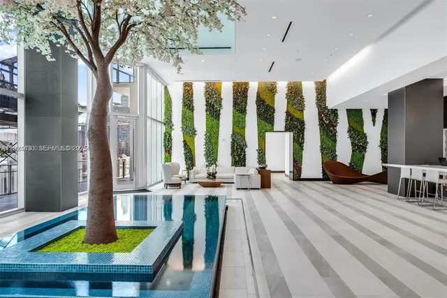 a view of a an empty room with windows