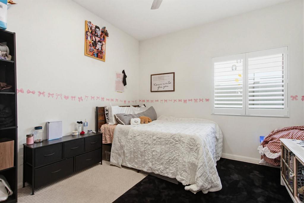 35647 Garrano Lane Fallbrook, CA 92028 - Photo 27 of 67 a bedroom with a bed and a window