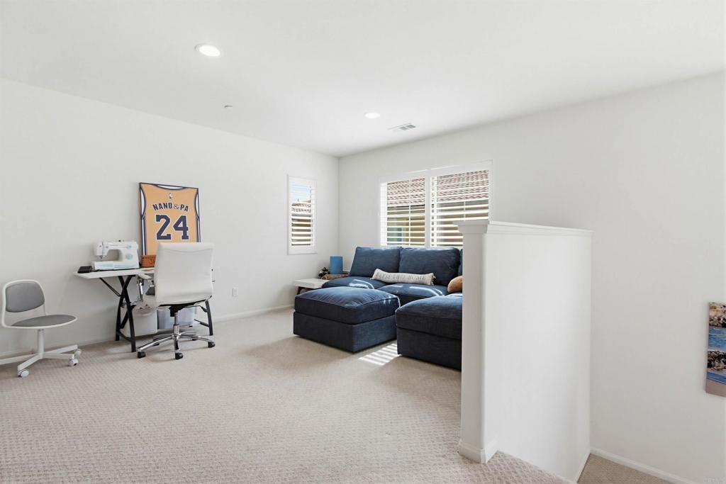 35647 Garrano Lane Fallbrook, CA 92028 - Photo 32 of 67 a living room with furniture and a window