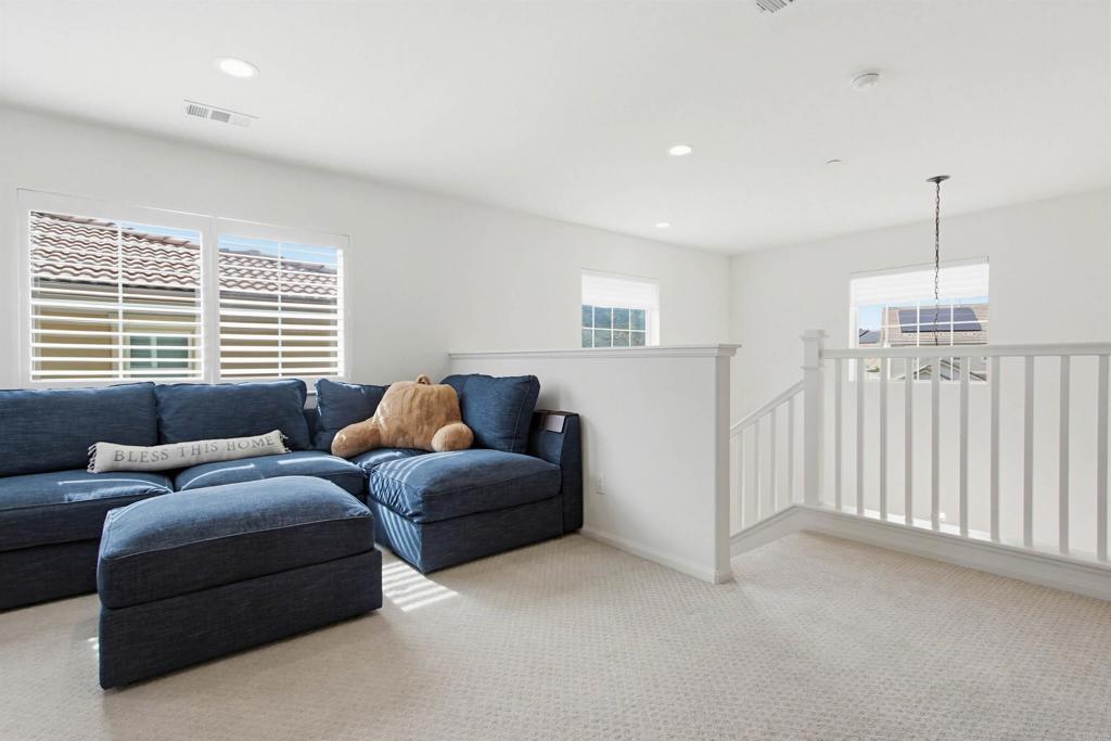 35647 Garrano Lane Fallbrook, CA 92028 - Photo 33 of 67 a living room with furniture and windows