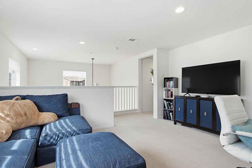 35647 Garrano Lane Fallbrook, CA 92028 - Photo 34 of 67 a living room with furniture and a flat screen tv
