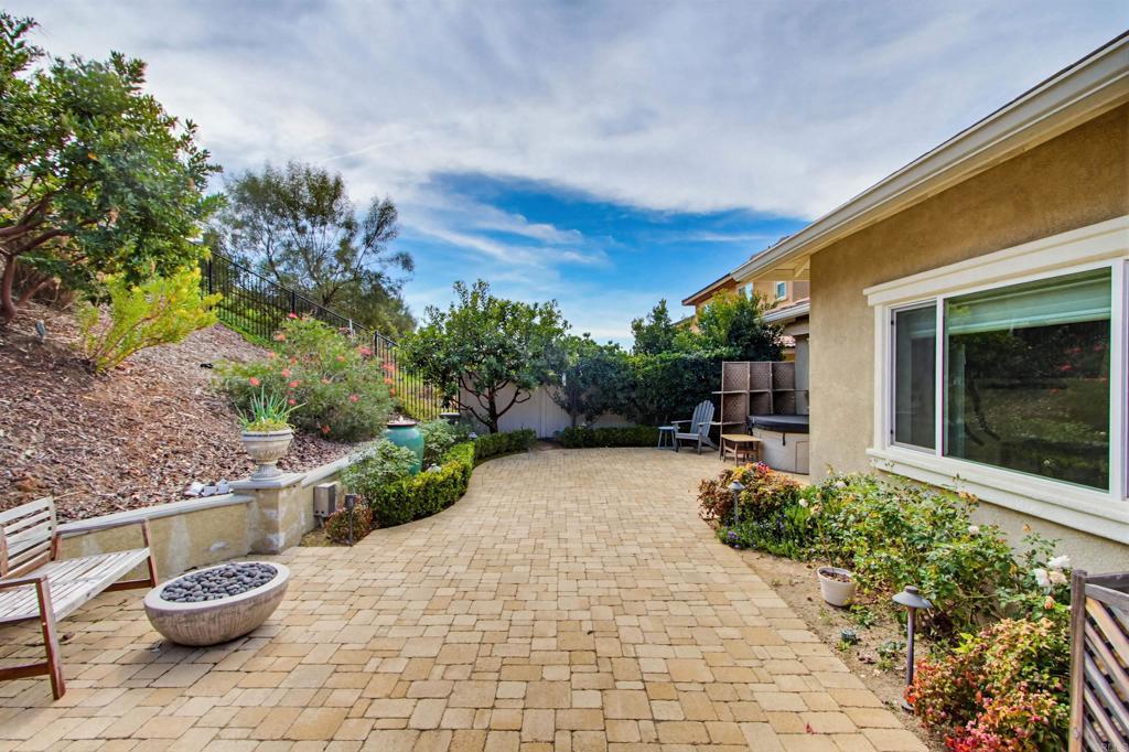 35647 Garrano Lane Fallbrook, CA 92028 - Photo 47 of 67 a house with potted plants in front of it