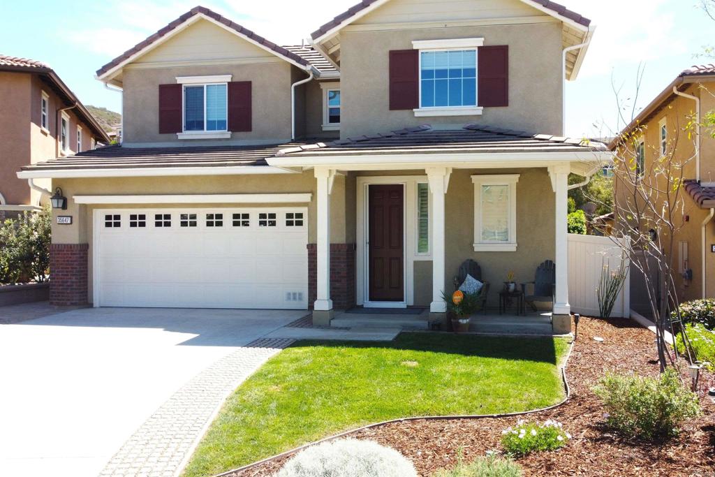 35647 Garrano Lane Fallbrook, CA 92028 - Photo 50 of 67 a front view of a house with a yard