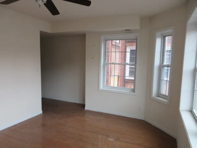 an empty room with windows