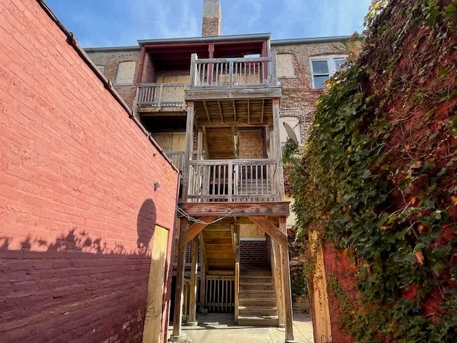 a front view of a house with deck