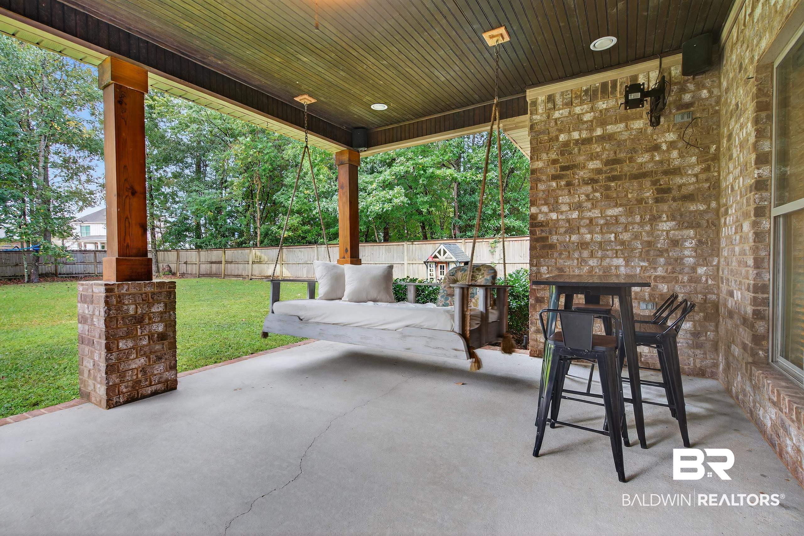 5517 Rabbit Creek Drive Theodore, AL 36582 - Photo 27 of 33 Fenced backyard featuring a patio