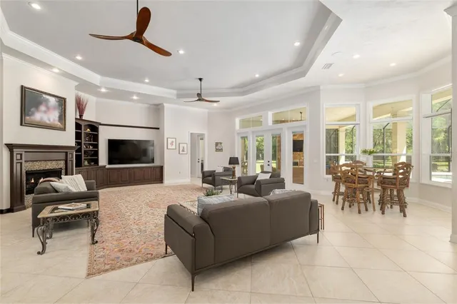 a spacious bedroom with a bed and a window