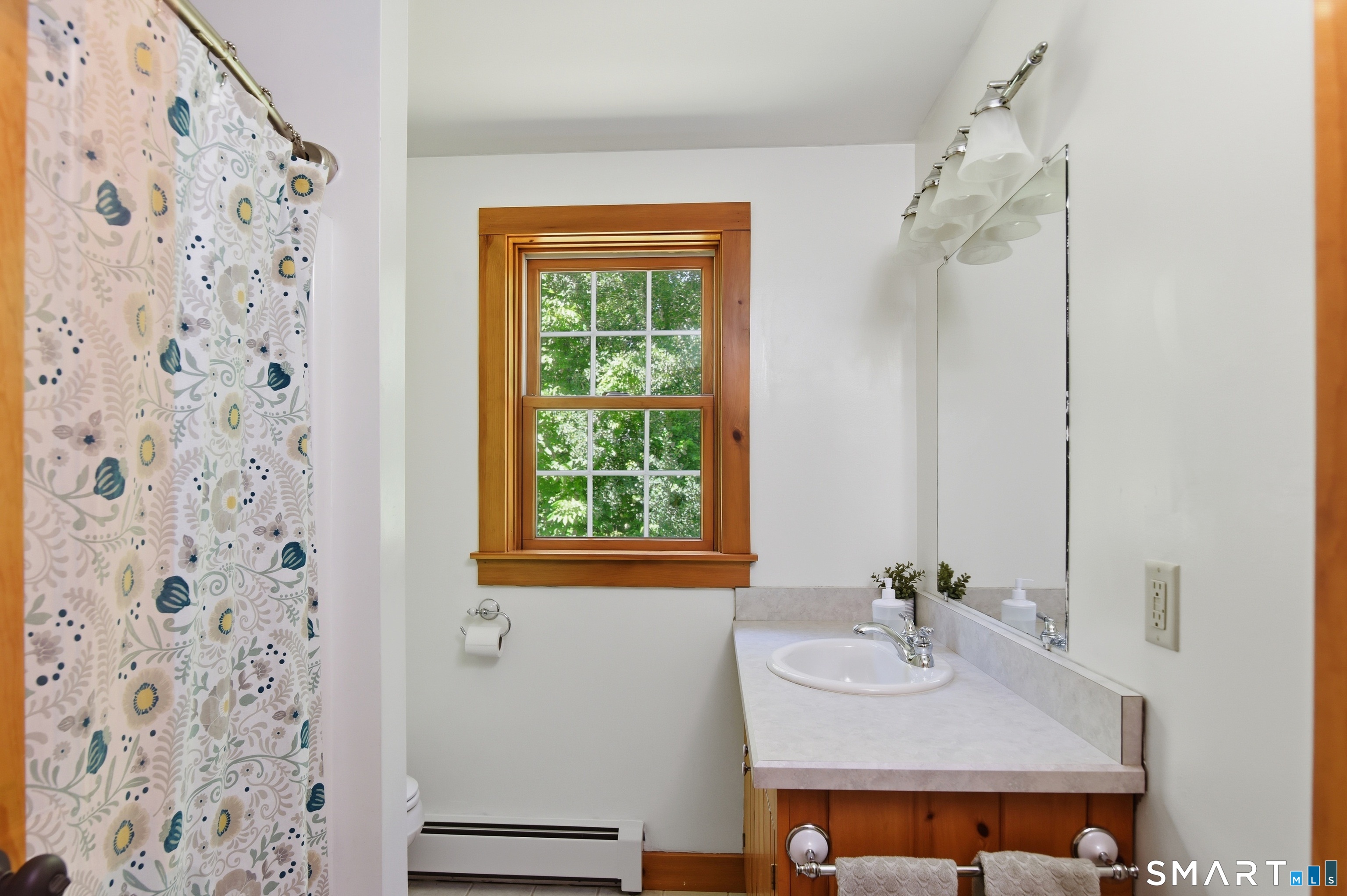 80 West Quasset Road Woodstock, CT 06281 - Photo 34 of 38 Full bath with tub/shower serves secondary bedrooms.
