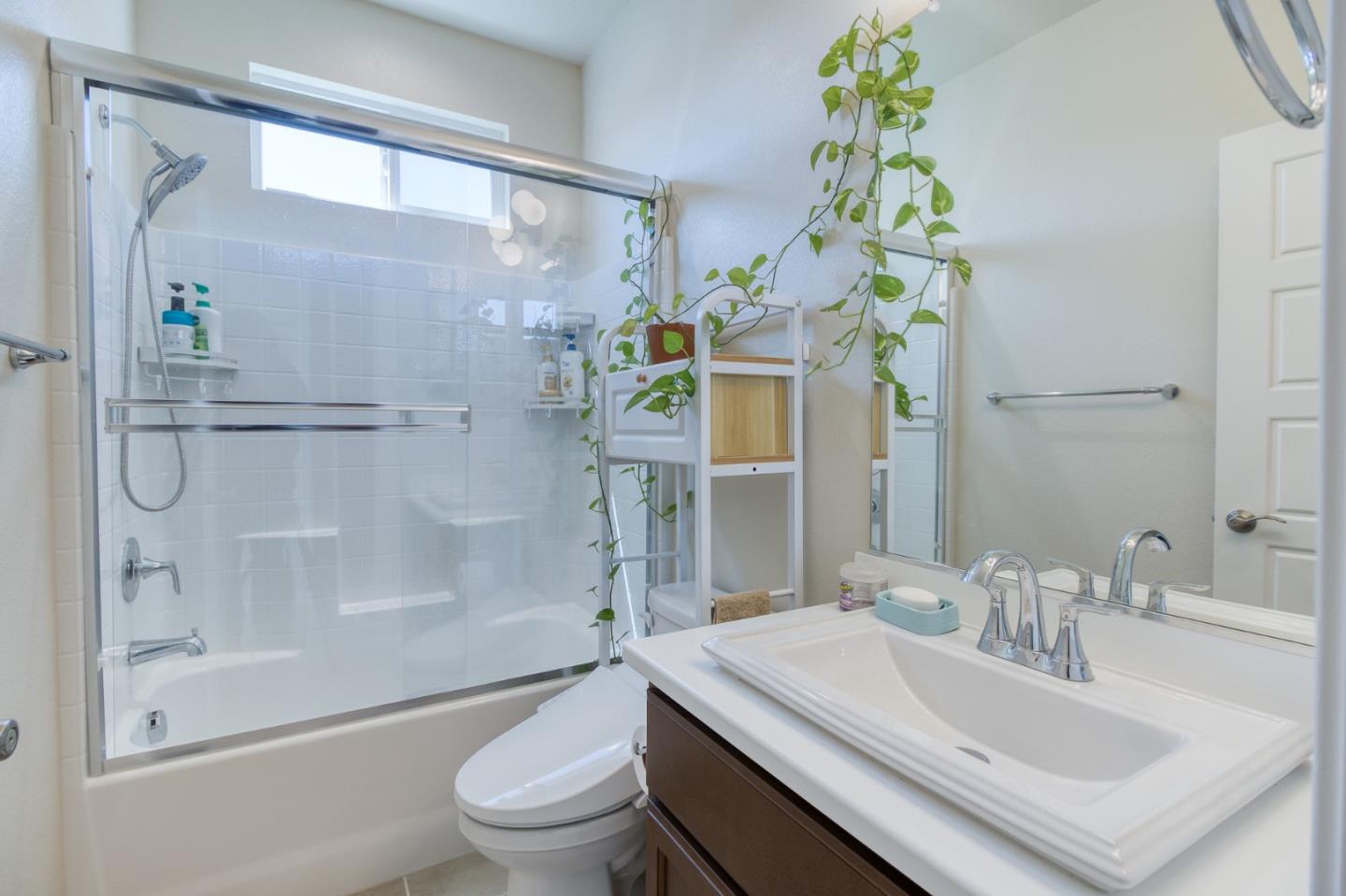4341 Trailblazer Way Modesto, CA 95356 - Photo 7 of 27 a bathroom with a sink toilet and shower