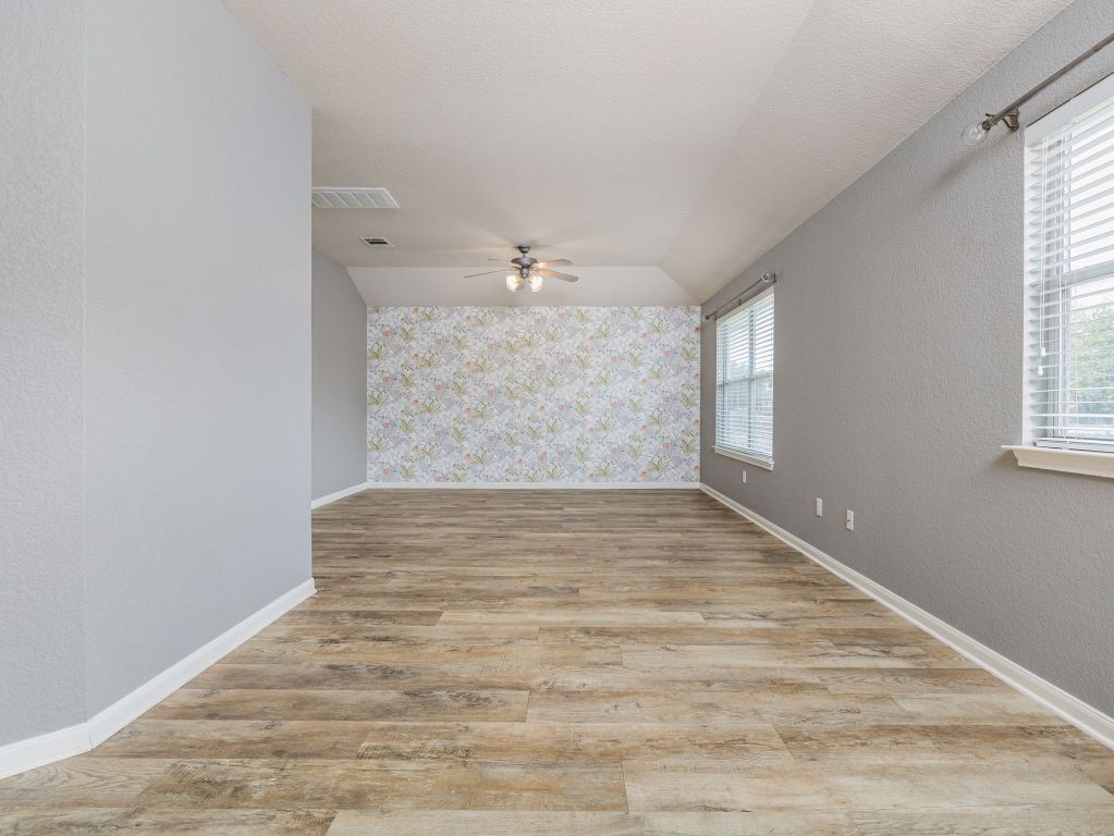2349 Caprock Place Georgetown, TX 78626 - Photo 17 of 38 wooden floor in an empty room