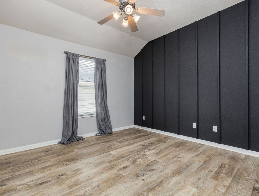 2349 Caprock Place Georgetown, TX 78626 - Photo 28 of 38 a view of a room with wooden floor