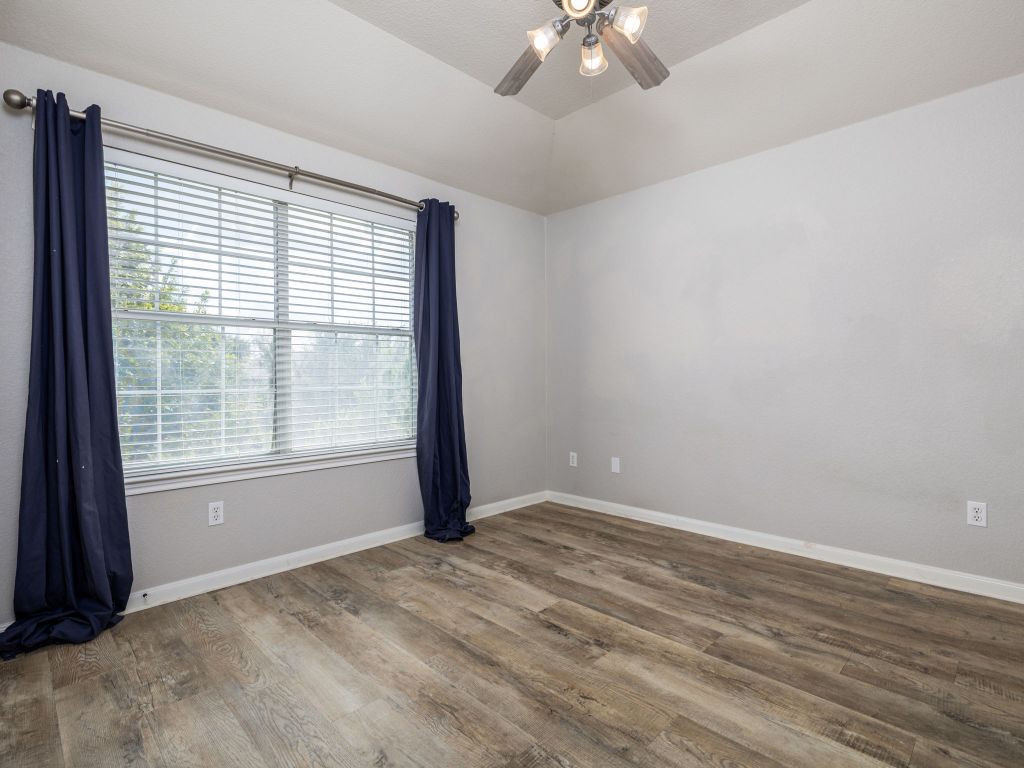 2349 Caprock Place Georgetown, TX 78626 - Photo 30 of 38 a view of an empty room with a window