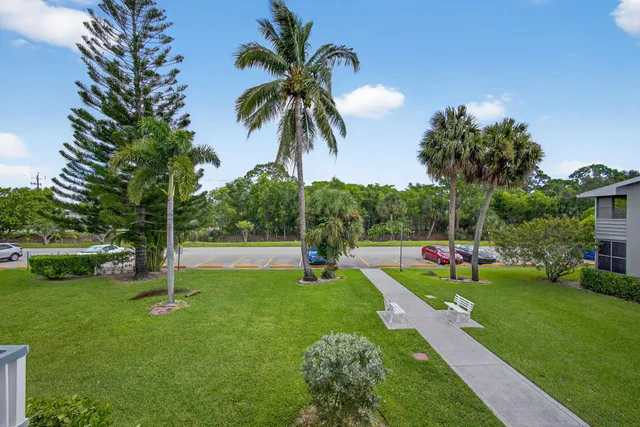 a view of a park with swings and slides