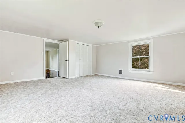 an empty room with windows