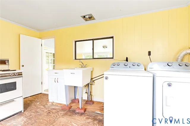 a utility room with dryer and washer