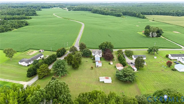a view of a lake with a yard