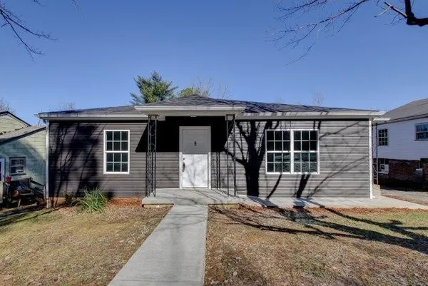 a front view of a house with porch