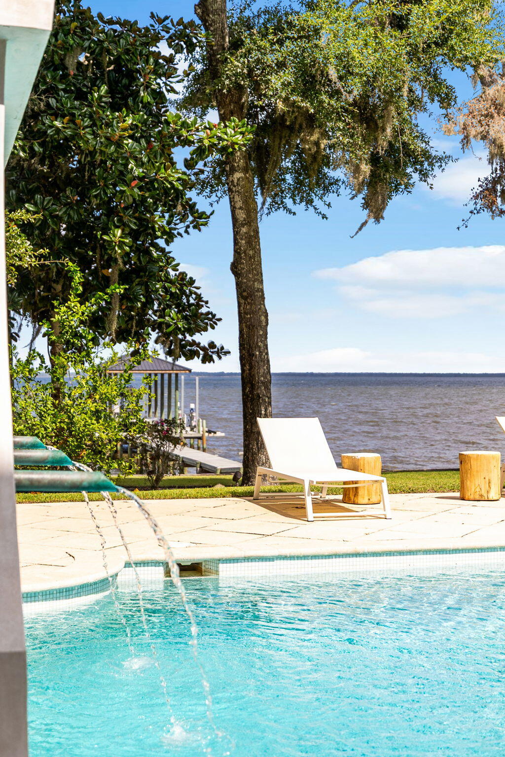 147 Ansley Forest Drive Santa Rosa Beach, FL 32459 - Photo 16 of 48 a view of a swimming pool with an outdoor space and seating area