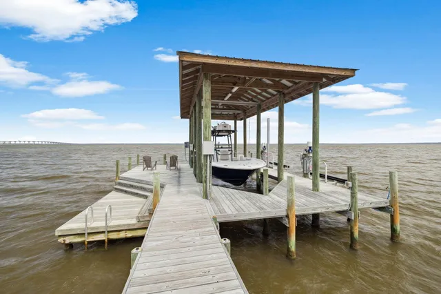 a view of roof deck with patio